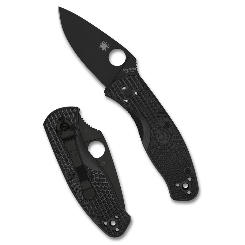 Load image into Gallery viewer, Black folding knife with textured handle on a white background
