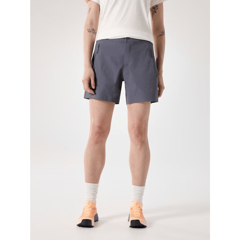 Load image into Gallery viewer, Person wearing gray shorts on a white background
