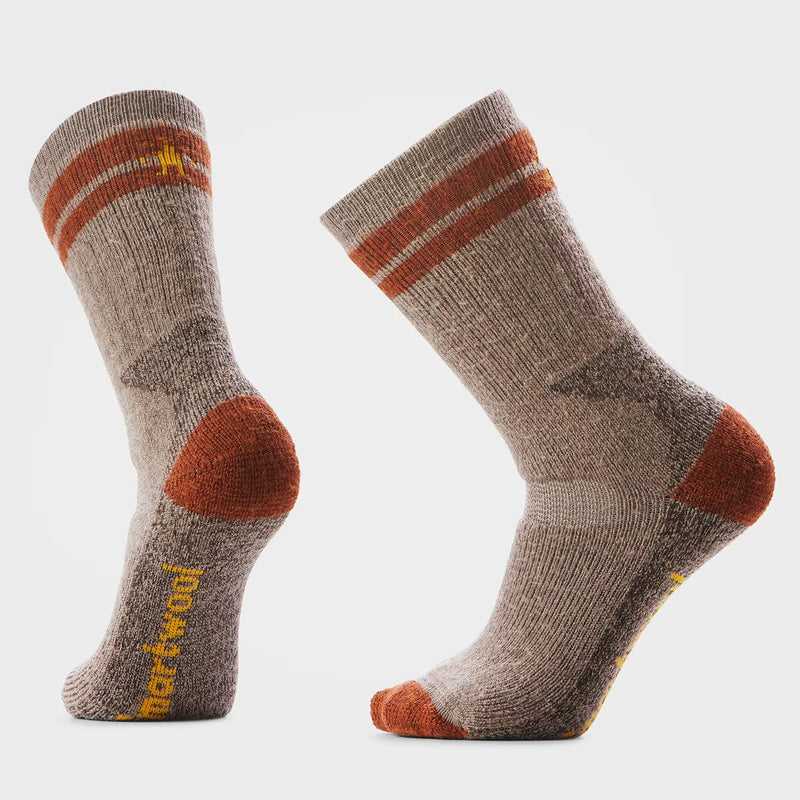 Load image into Gallery viewer, Pair of brown socks with orange accents on a light gray background
