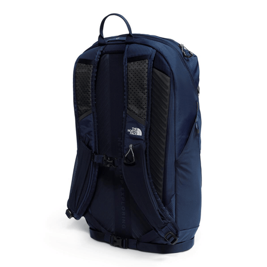 Navy blue backpack with The North Face logo on a white background