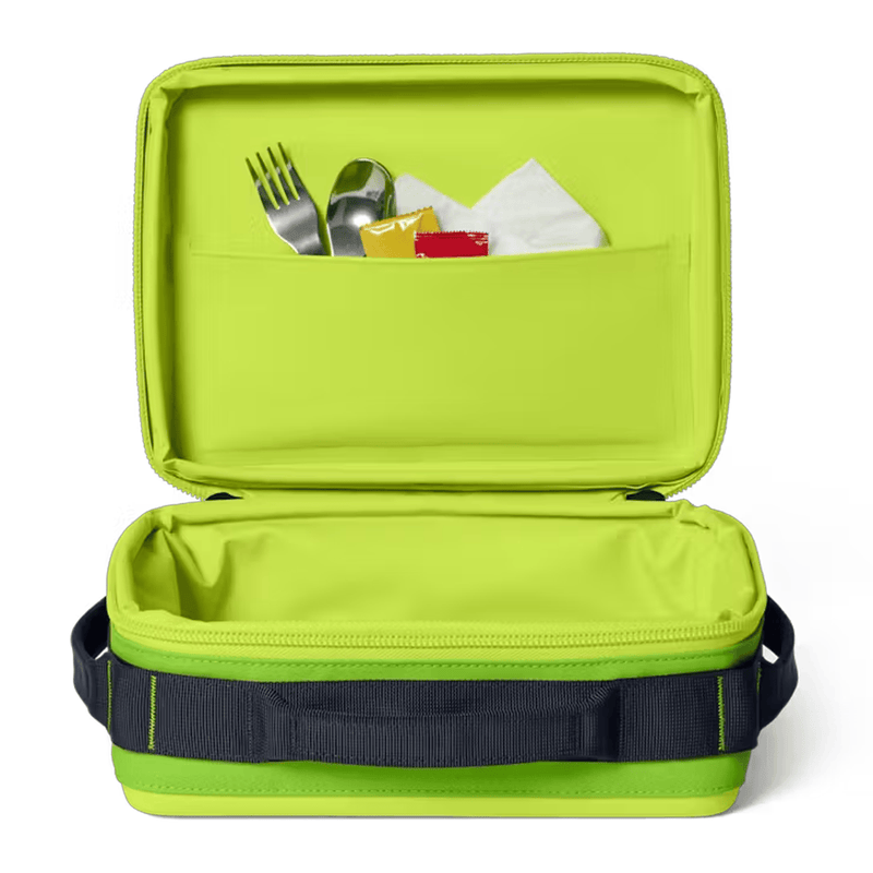 Load image into Gallery viewer, Green lunch box with compartments for food, utensils, and napkins on a white background
