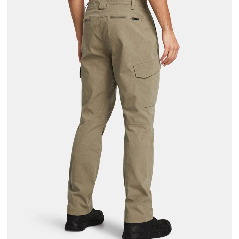 Load image into Gallery viewer, Beige pants worn by a person on a white background
