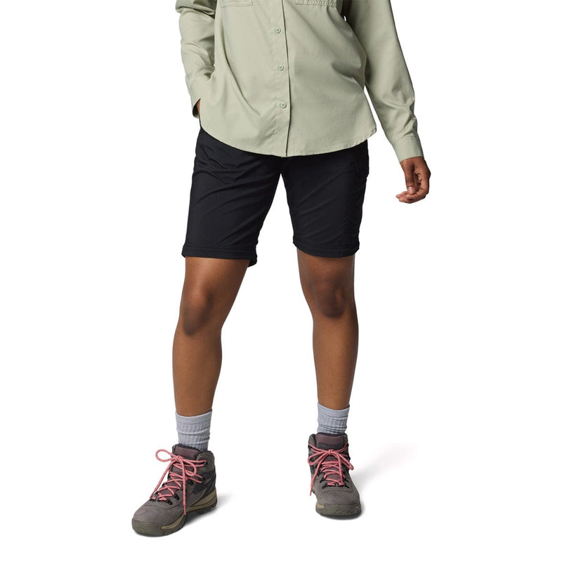 Load image into Gallery viewer, Person wearing black shorts, a light-colored shirt, hiking boots, and socks on a white background
