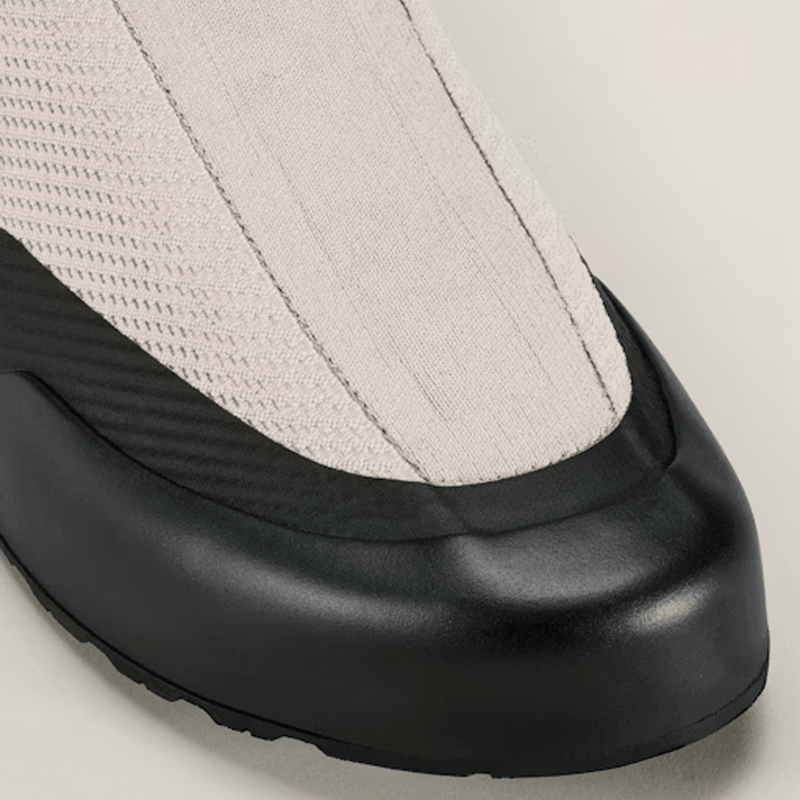 Load image into Gallery viewer, Close-up of a shoe sole with black rubber and gray fabric
