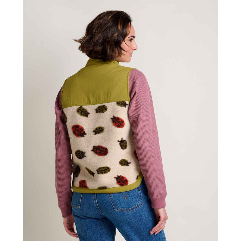 Load image into Gallery viewer, Person wearing a colorful vest with ladybug pattern on a plain background
