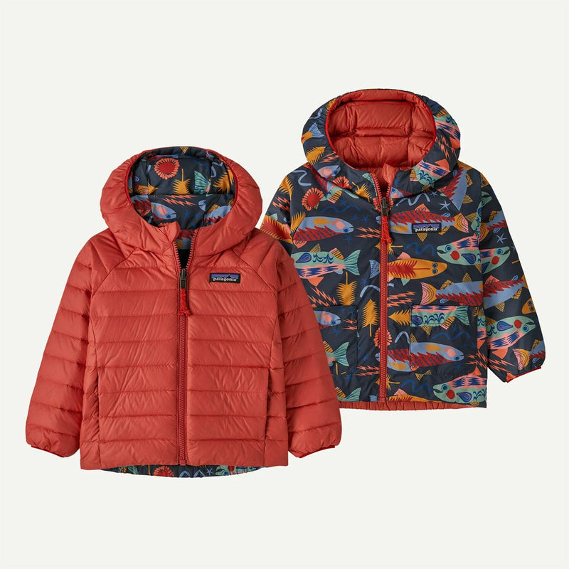 Load image into Gallery viewer, Two children's jackets, one red and one with a colorful pattern, on a light gray background.
