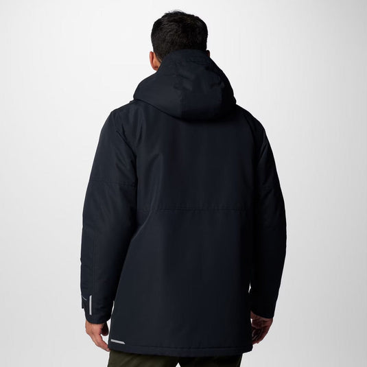 Person wearing a black jacket on a white background