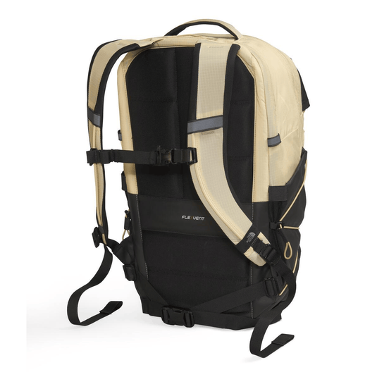 Beige and black backpack on a white background