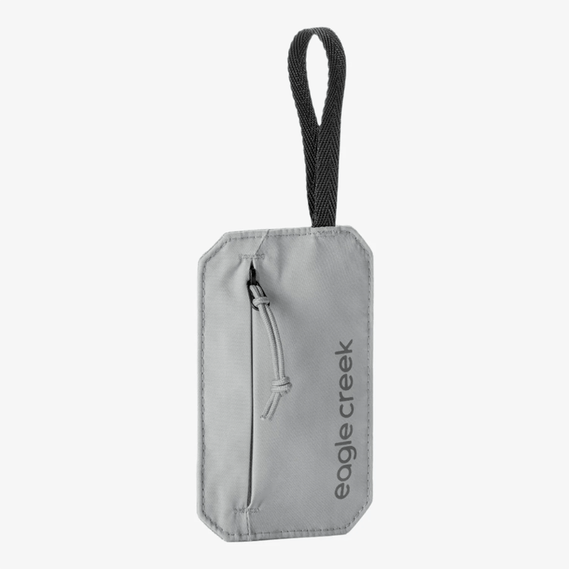 Load image into Gallery viewer, Gray pouch with a black strap on a white background, featuring the 'eagle creek' brand.
