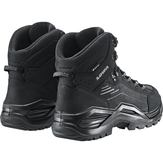 Black hiking boots with brand logo on a white background