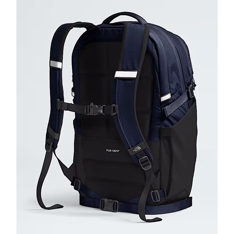 Load image into Gallery viewer, Black and navy backpack with visible brand logo on a light gray background
