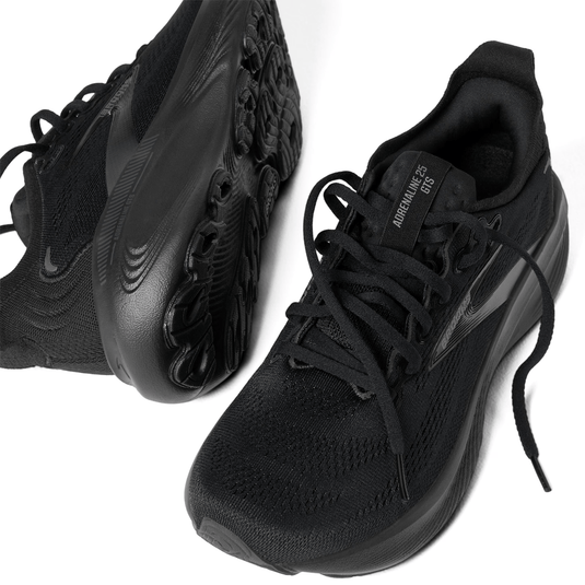 Black athletic shoes on a white background