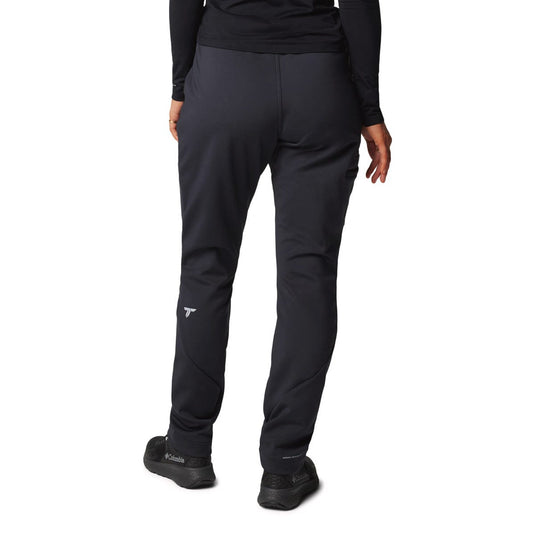 Black pants worn by a person on a white background