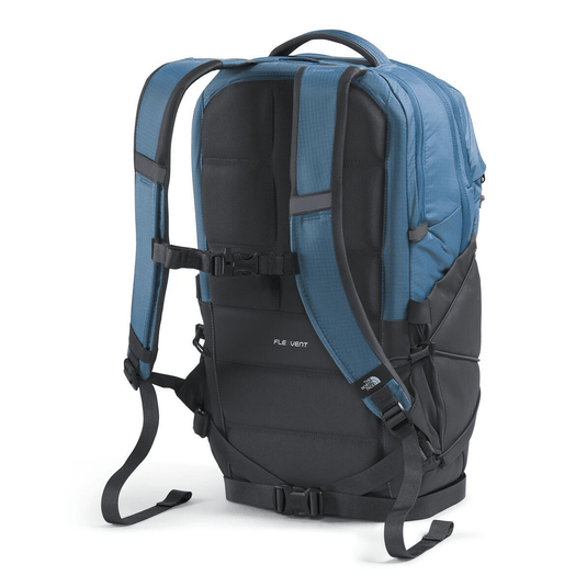 Blue and black backpack on a white background