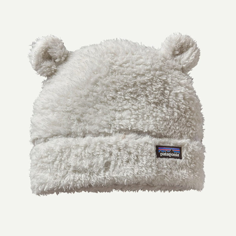 Load image into Gallery viewer, White fleece beanie with bear ears and Patagonia logo on a white background
