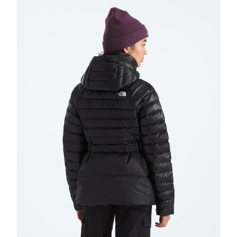Load image into Gallery viewer, Person wearing a black puffer jacket and purple beanie on a white background

