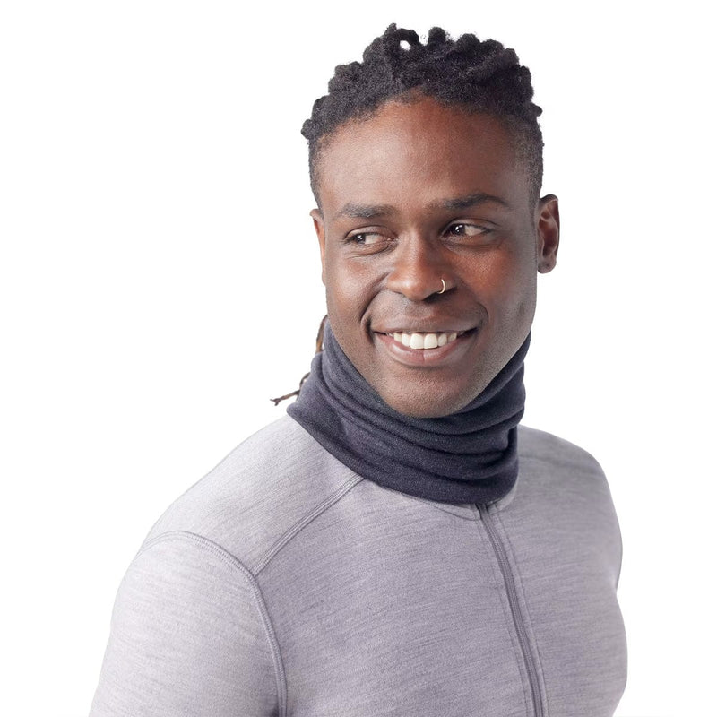 Load image into Gallery viewer, Man wearing a gray long-sleeve shirt and dark gray neck gaiter on a white background
