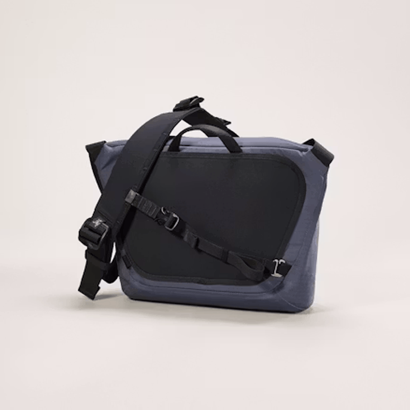 Load image into Gallery viewer, Blue and black bag with a strap on a light gray background
