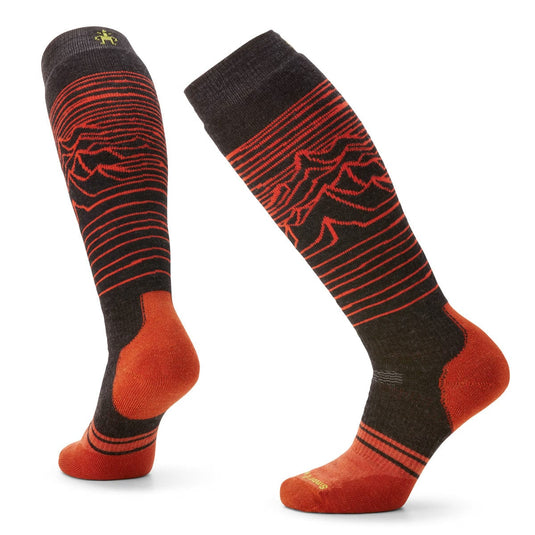 Pair of black and red patterned socks on a white background