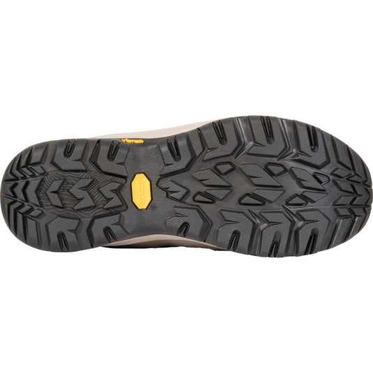 Close-up of a shoe sole with a textured pattern on a white background