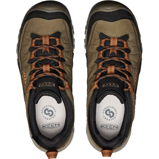 Pair of Keen hiking shoes on a white background