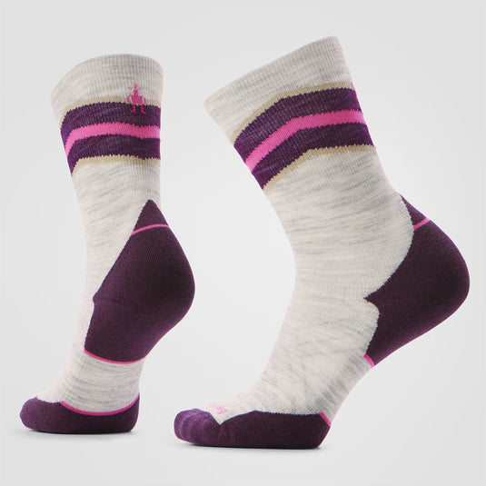 Pair of socks with purple and pink stripes on a light gray background