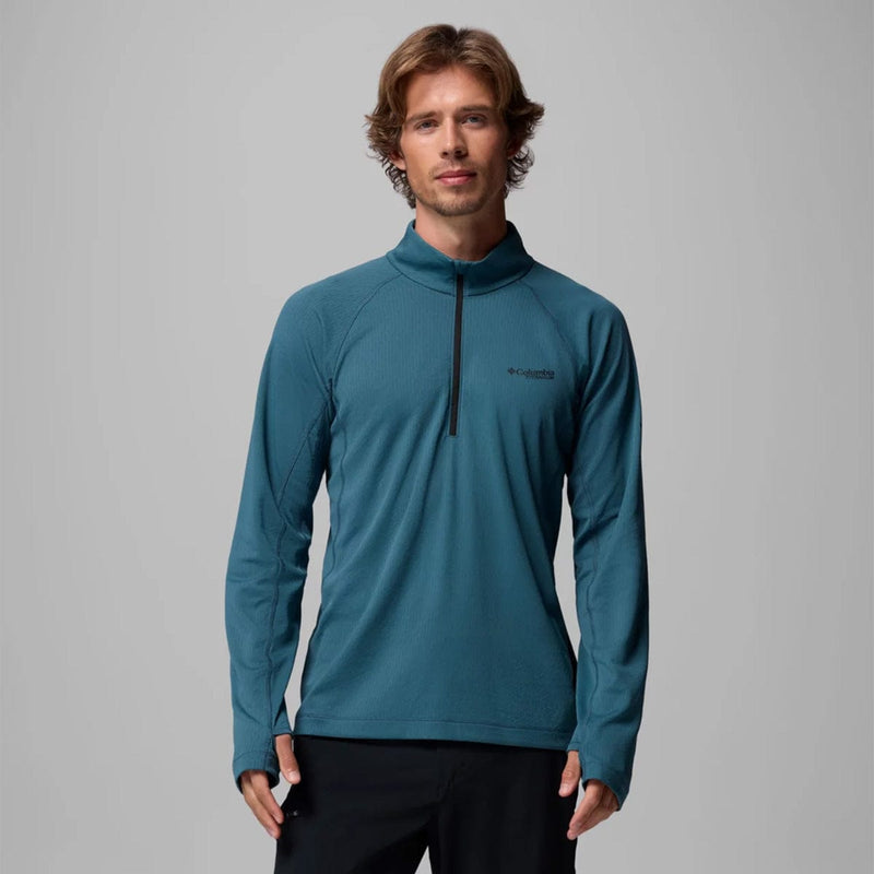 Load image into Gallery viewer, Man wearing a teal long-sleeve pullover with a zipper on a gray background
