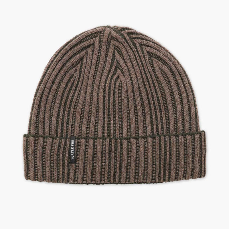 Load image into Gallery viewer, Brown ribbed knit beanie with a brand label on a light gray background
