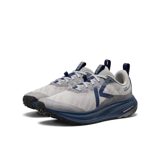 Gray and blue running shoes on a white background