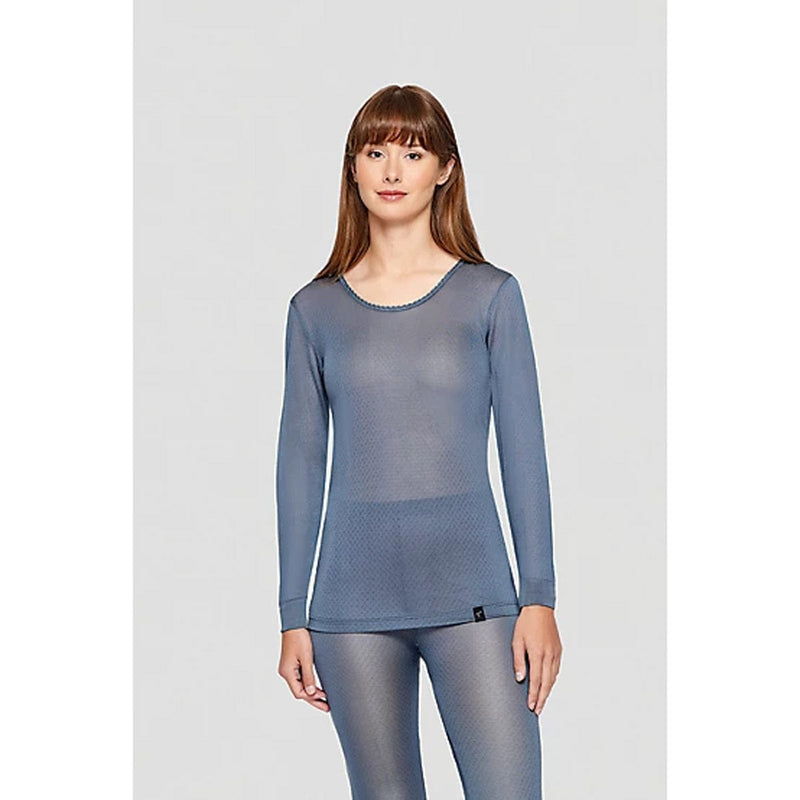 Load image into Gallery viewer, Woman wearing a blue long-sleeve top and leggings on a light gray background
