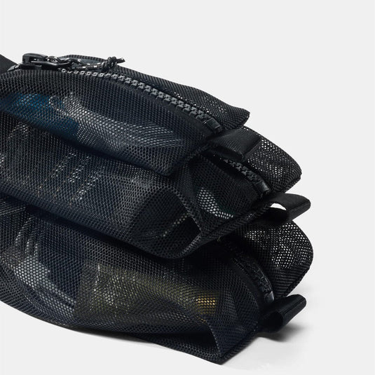 Black mesh bag with zippers on a white background