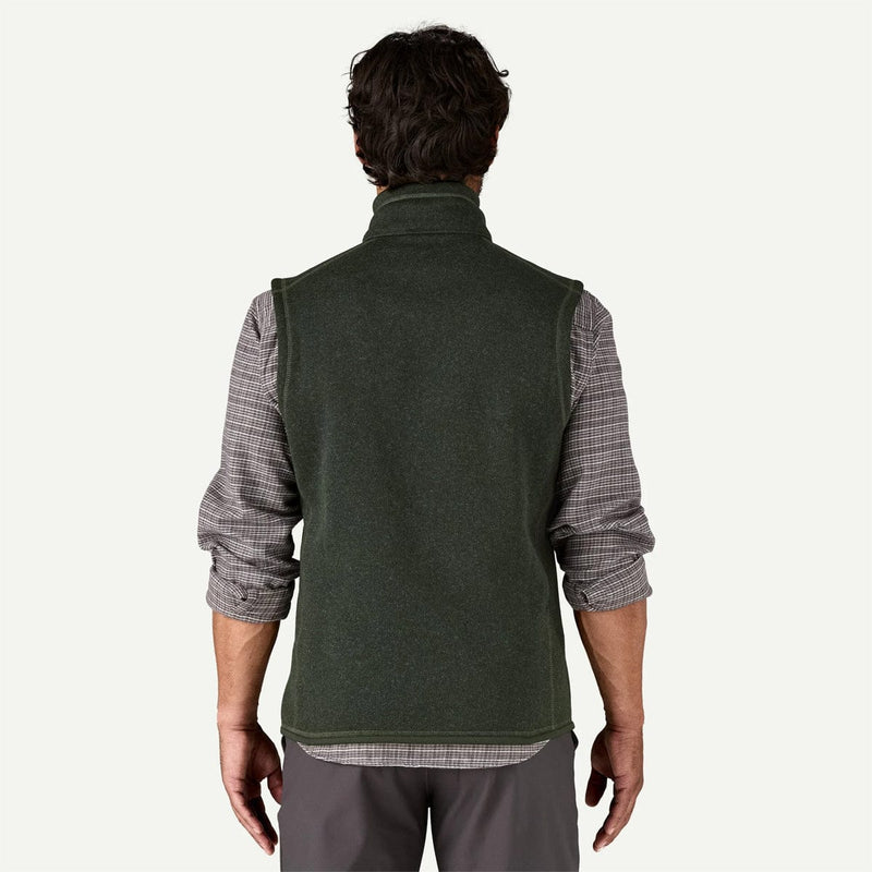 Load image into Gallery viewer, Man wearing a green vest over a plaid shirt on a white background
