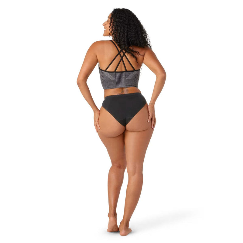 Load image into Gallery viewer, Woman wearing a gray bikini top and black bottoms on a white background
