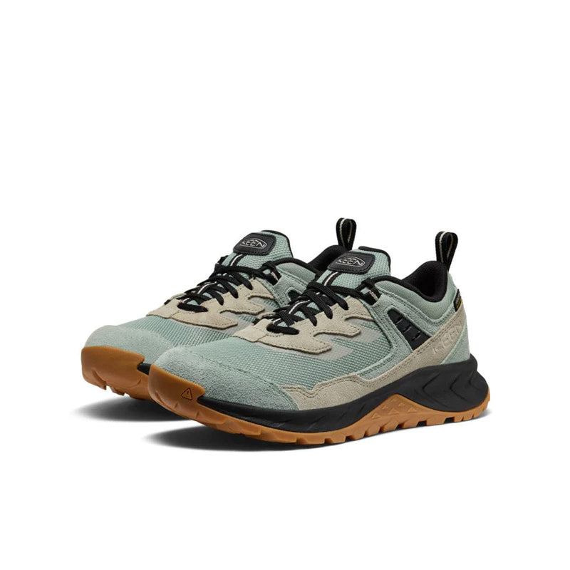 Load image into Gallery viewer, Pair of green and black sneakers with brown soles on a white background
