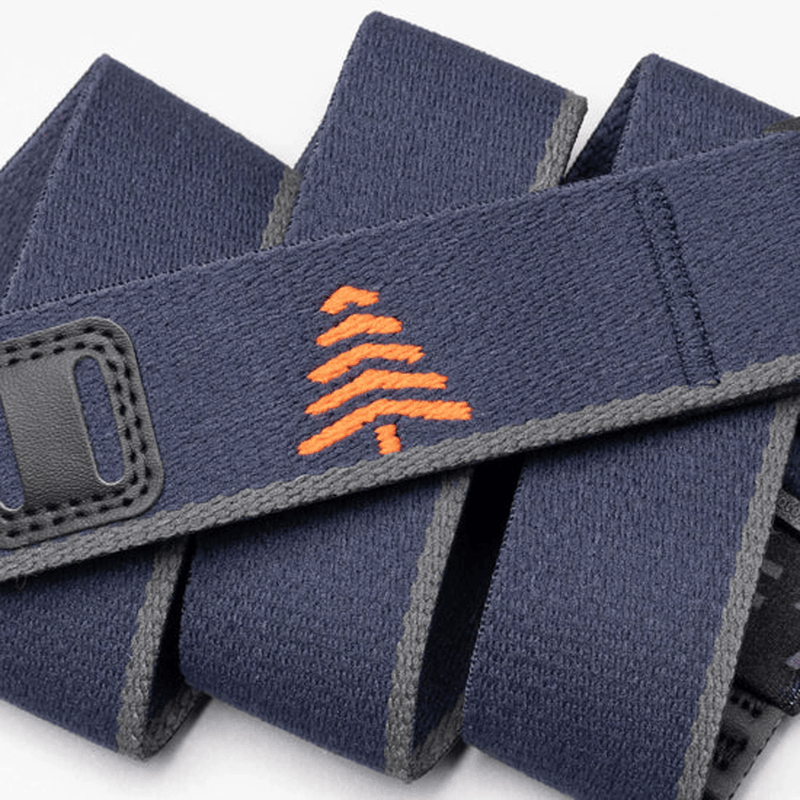Load image into Gallery viewer, Navy blue wrist wrap with orange logo on a white background
