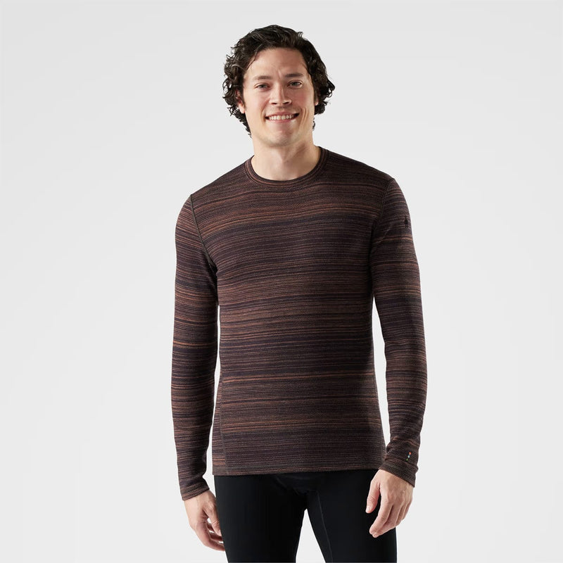 Load image into Gallery viewer, Man wearing a brown striped long-sleeve shirt on a white background
