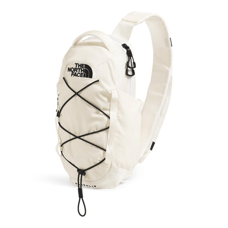 Load image into Gallery viewer, White sling bag with The North Face logo on a white background
