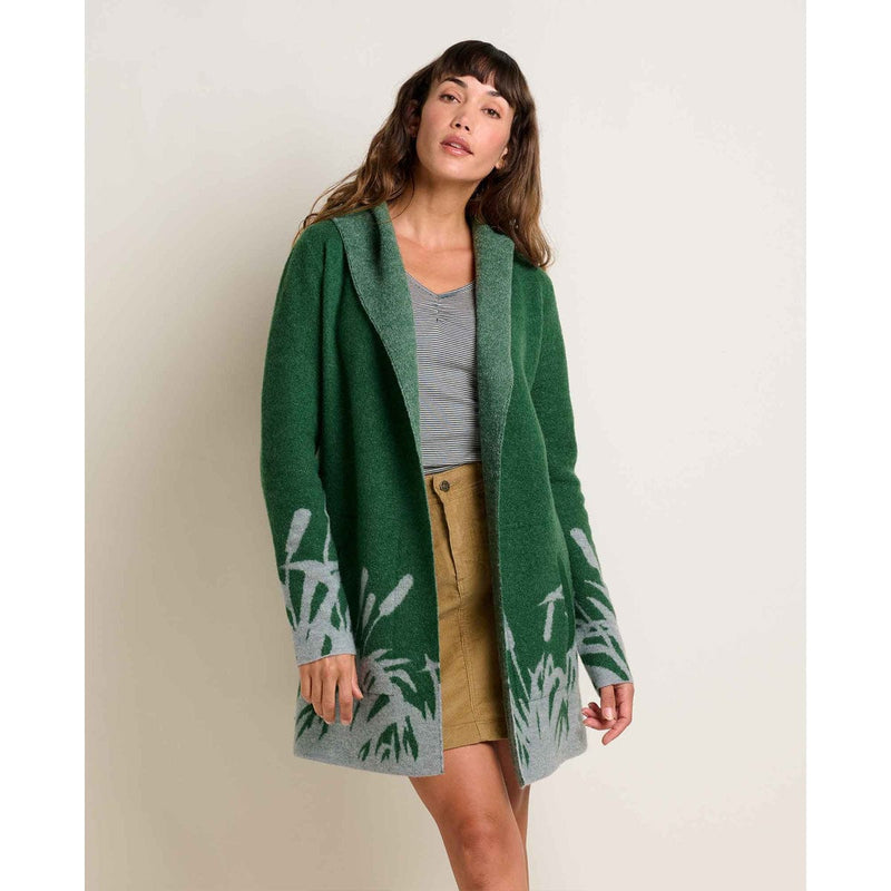 Load image into Gallery viewer, Woman wearing a green cardigan with leaf pattern on a plain background
