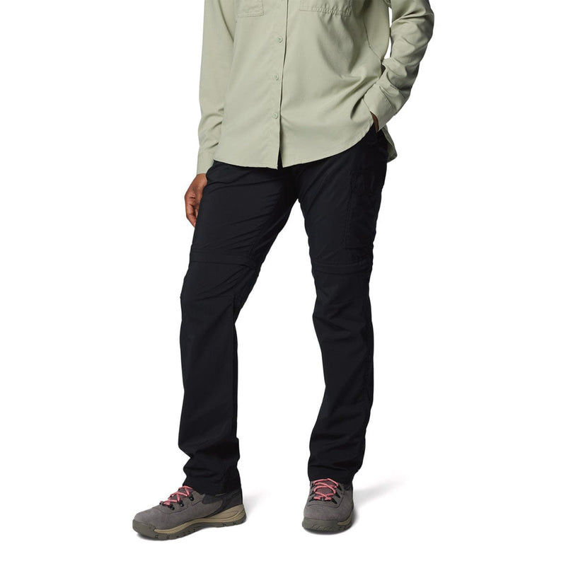 Load image into Gallery viewer, Person wearing black pants and a light-colored shirt on a white background
