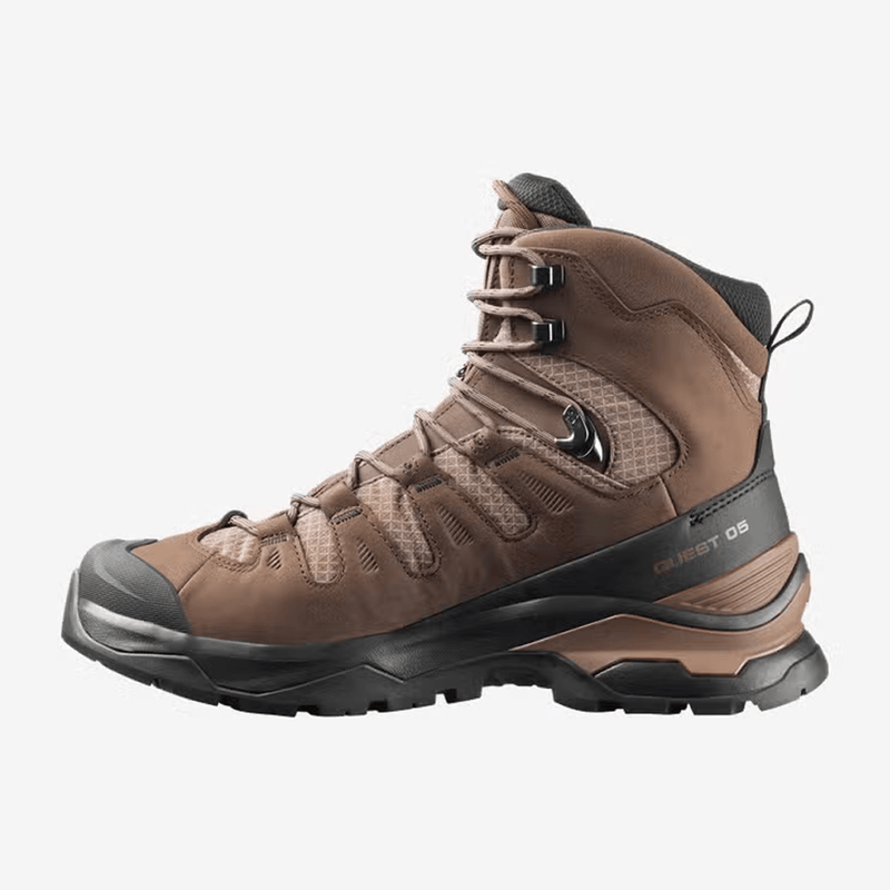 Load image into Gallery viewer, Brown hiking boot with black sole on a white background
