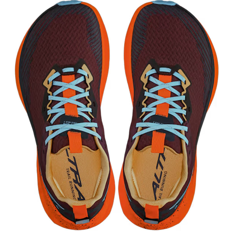 Load image into Gallery viewer, Pair of maroon and orange running shoes with blue laces on a white background
