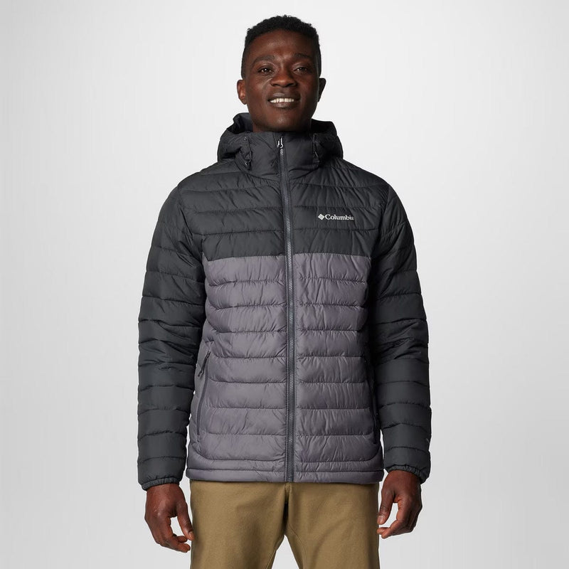 Load image into Gallery viewer, Man wearing a Columbia gray puffer jacket on a white background
