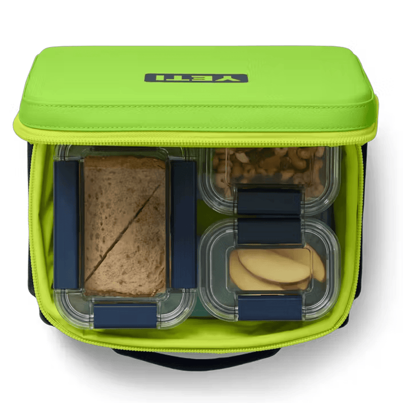 Load image into Gallery viewer, Green lunch bag with compartments containing a sandwich and snacks on a white background
