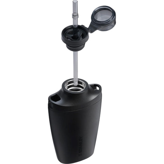 Black tumbler with lid and straw on a white background