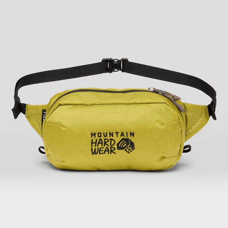 Load image into Gallery viewer, Yellow waist bag with black strap on a light gray background, featuring 'Mountain Hardwear' branding.
