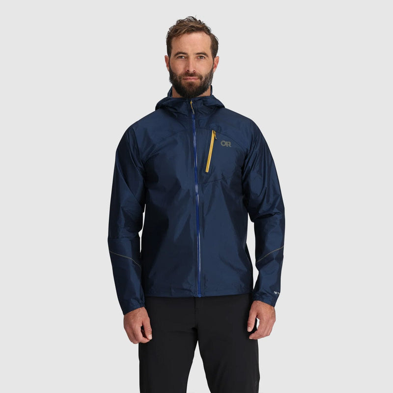 Load image into Gallery viewer, Man wearing a navy blue jacket with a brand logo on a light gray background
