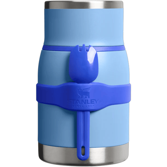 Blue Stanley tumbler with a blue grip on a white background