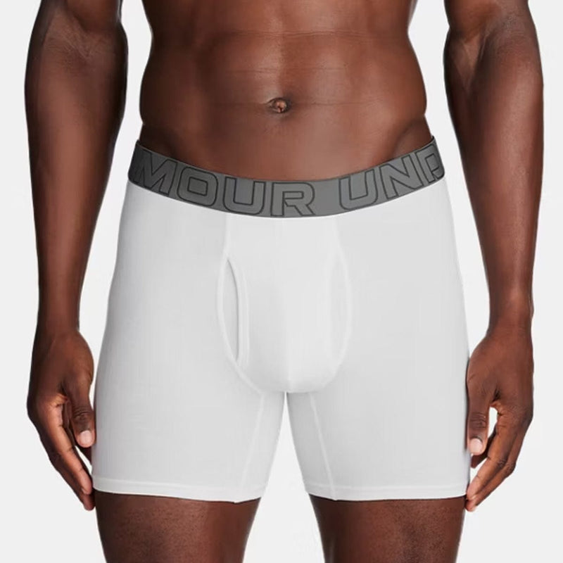 Load image into Gallery viewer, White boxer briefs with a gray waistband featuring a brand logo on a plain background
