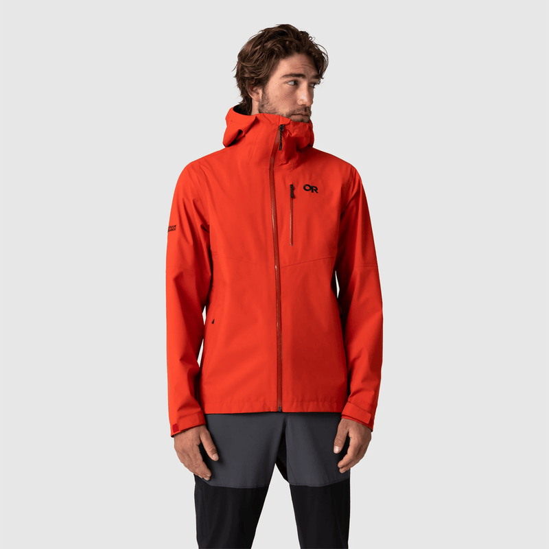 Load image into Gallery viewer, Person wearing a red jacket with a brand logo on a light gray background
