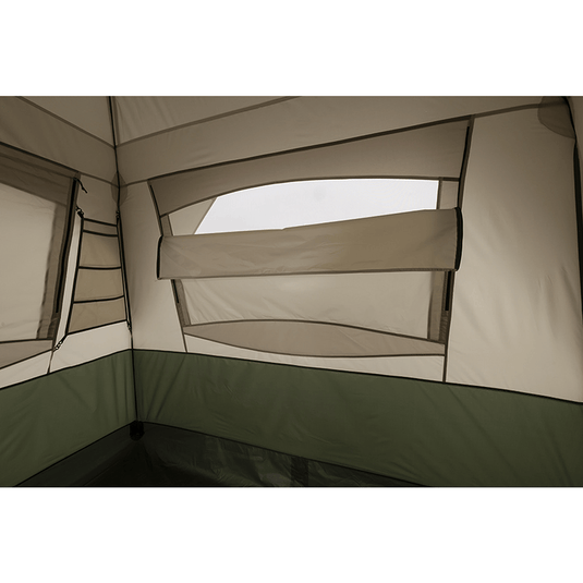 Camping tent interior with beige walls and green floor
